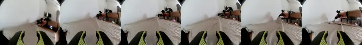 Six frames from the left gripper camera looking across the shirt between its jaws